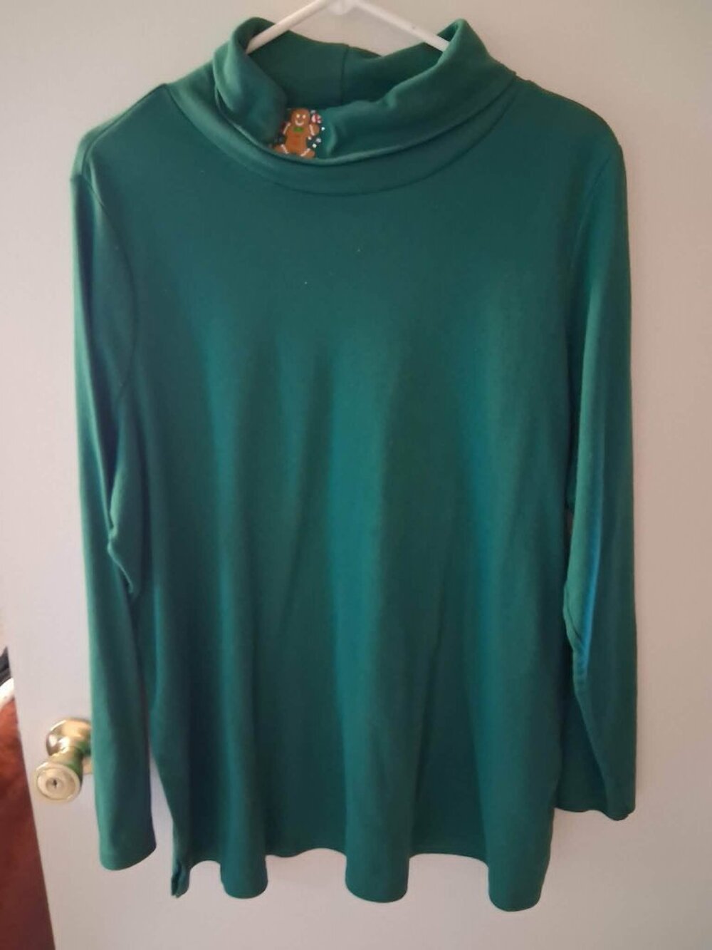Woman's Quacker Factory green turtleneck top with gingerbread man